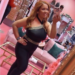 Body con jumpsuit very sterchy wearing a large very stretchy only  burgundy avai